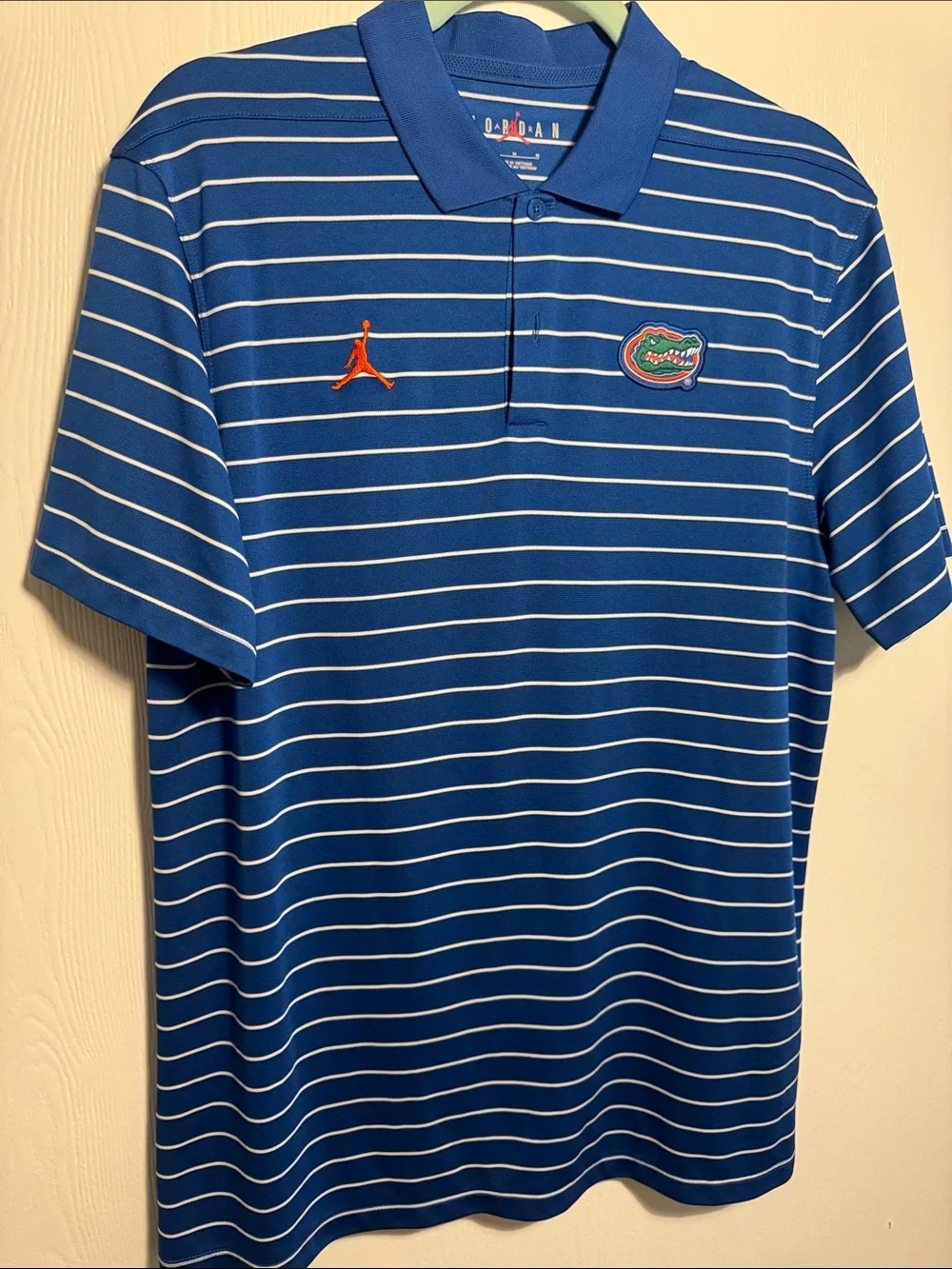 Jordan Blue and White Striped Polo with Orange Jumpman & Team Patch